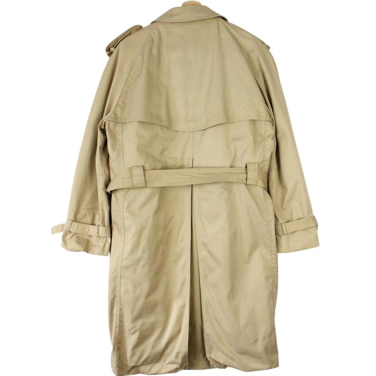 Burberry beige trench coat with Nova Check pattern, double breasted and belted design.