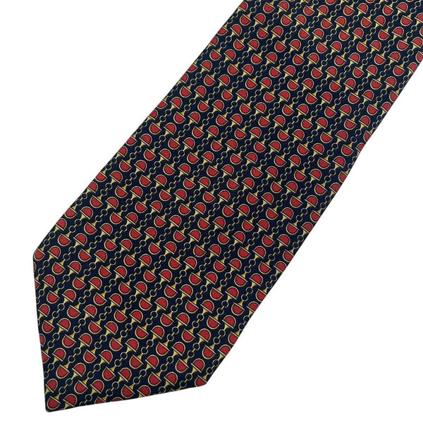 Gucci silk tie red and navy blue horsebit pattern with logo detail.
