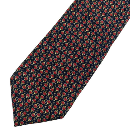 Gucci silk tie red and navy blue horsebit pattern with logo detail.