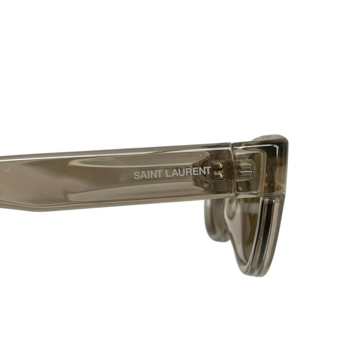 Saint Laurent transparent sunglasses with logo print, modern design, brand new condition.