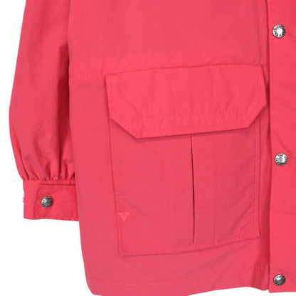 Gucci pink windbreaker jacket with North Face logo and full zip design.