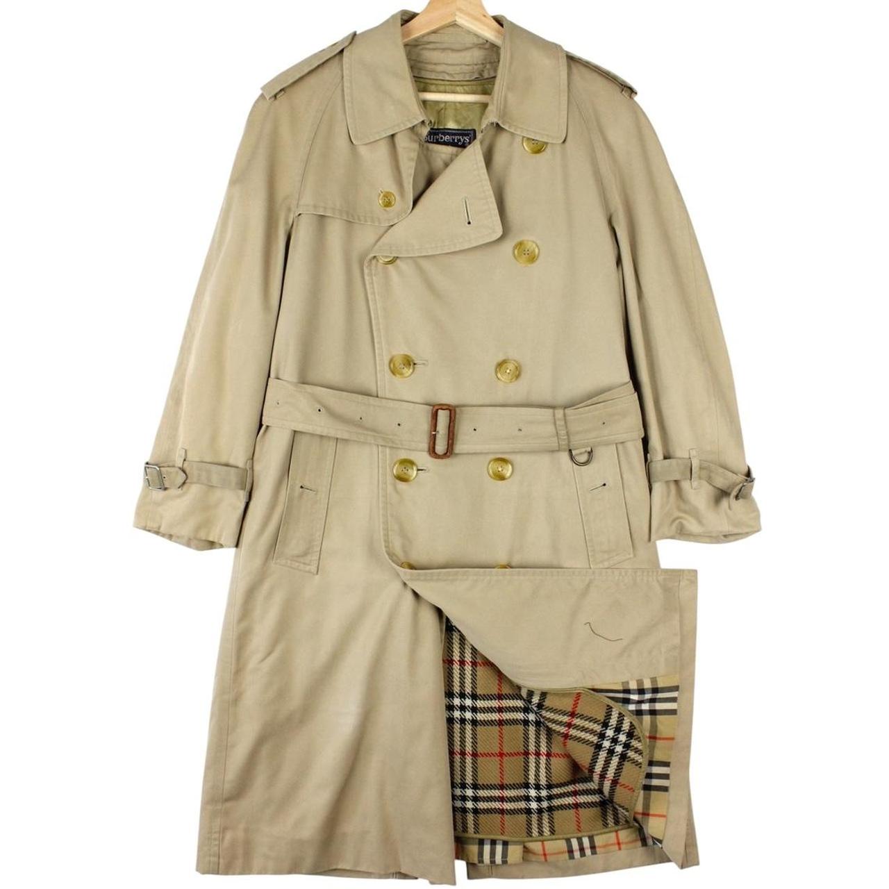 Burberry beige trench coat with Nova Check pattern, double-breasted and belted design.