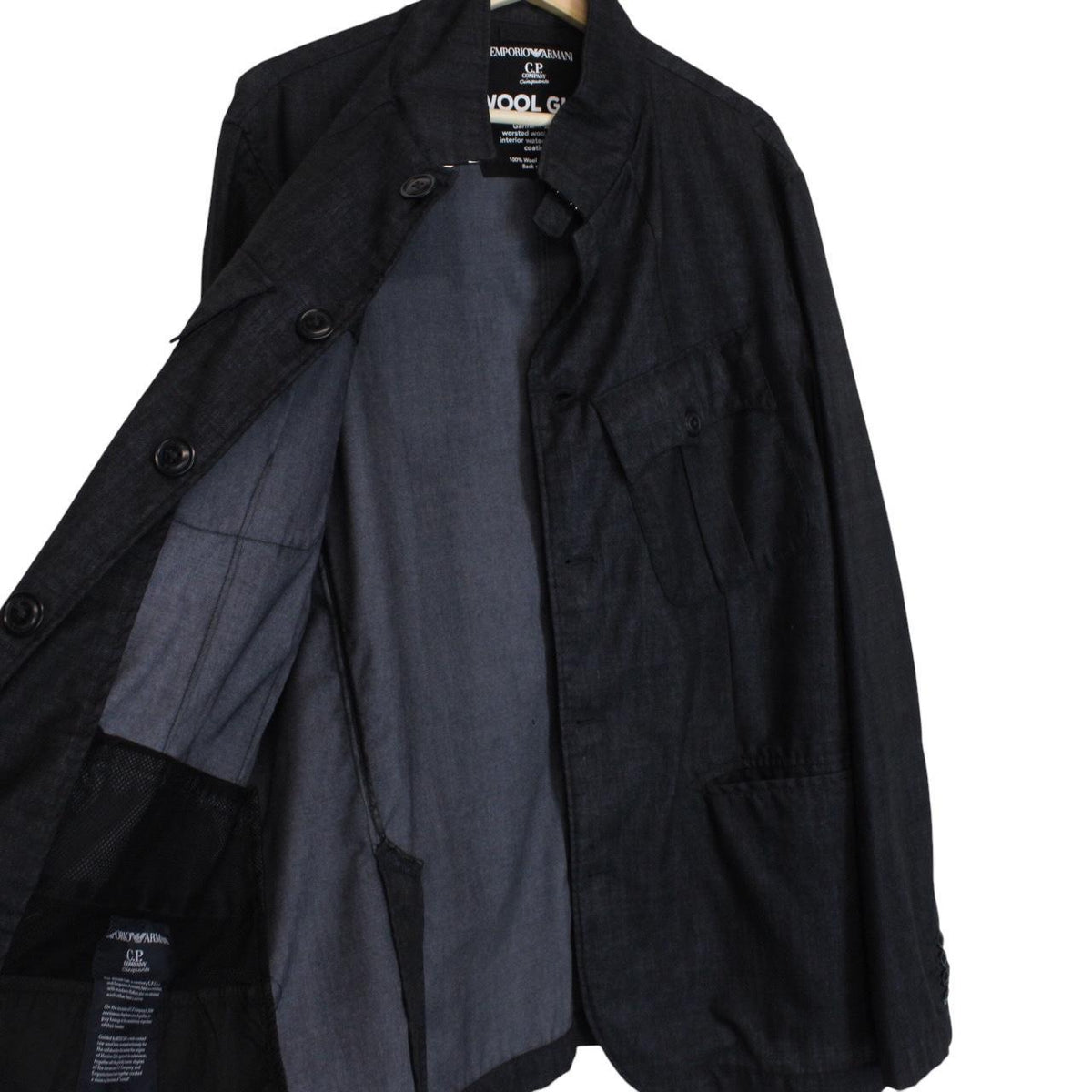 CP Company navy blue jacket garment dyed wool with logo details and gum finish.