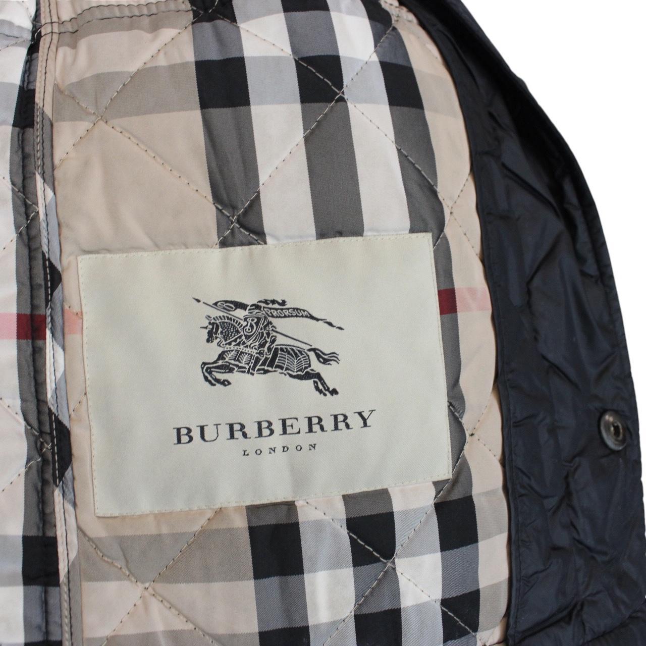 Burberry black quilted field jacket with Nova Check lining and diamond pattern.