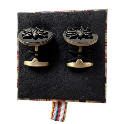 Paul Smith gunmetal cufflinks 2D spider design with intricate detailing and brand logo.