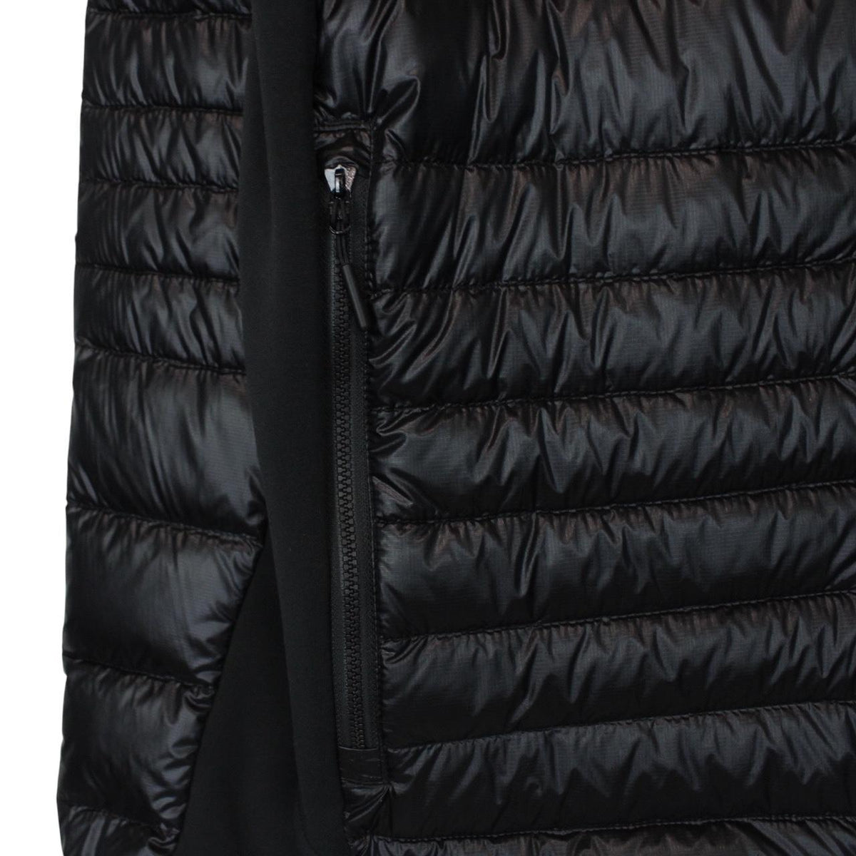 Canada Goose black down jacket with full zip and logo patch on sleeve.