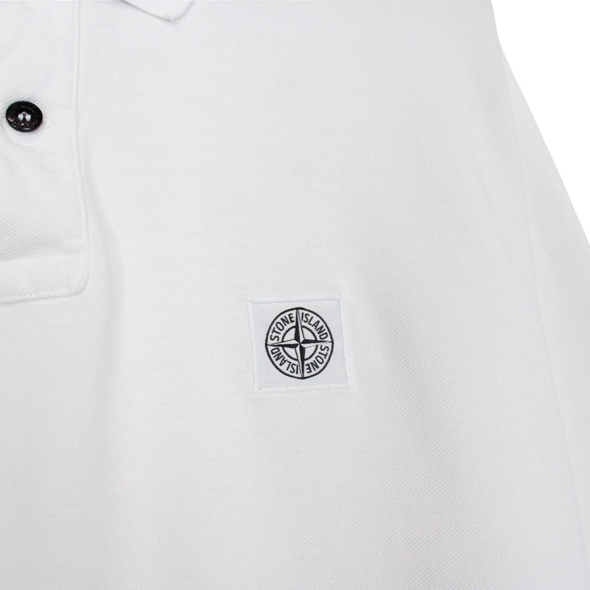 Stone Island white long sleeve polo shirt with embroidered compass logo and slim fit.