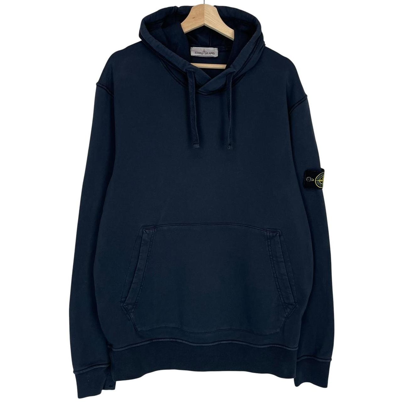 Stone Island navy blue cotton hoodie with iconic compass logo on sleeve.