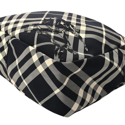 Burberry black and white EKD check canvas duffel bag with logo detail.