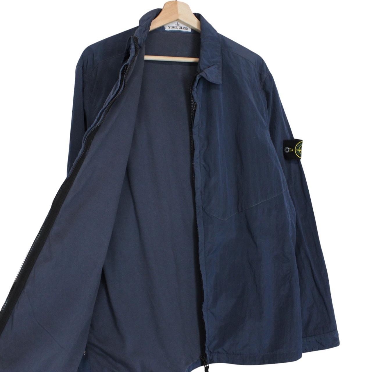 Stone Island navy blue full zip nylon overshirt with logo patch and metal finish.