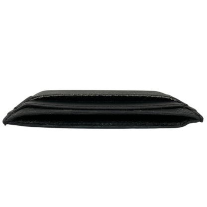 Louis Vuitton black and grey coated canvas double card holder with monogram pattern.