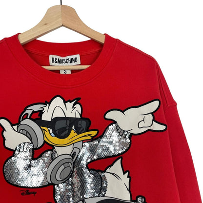 Moschino red cotton sweatshirt featuring Disney graphic print and logo details.