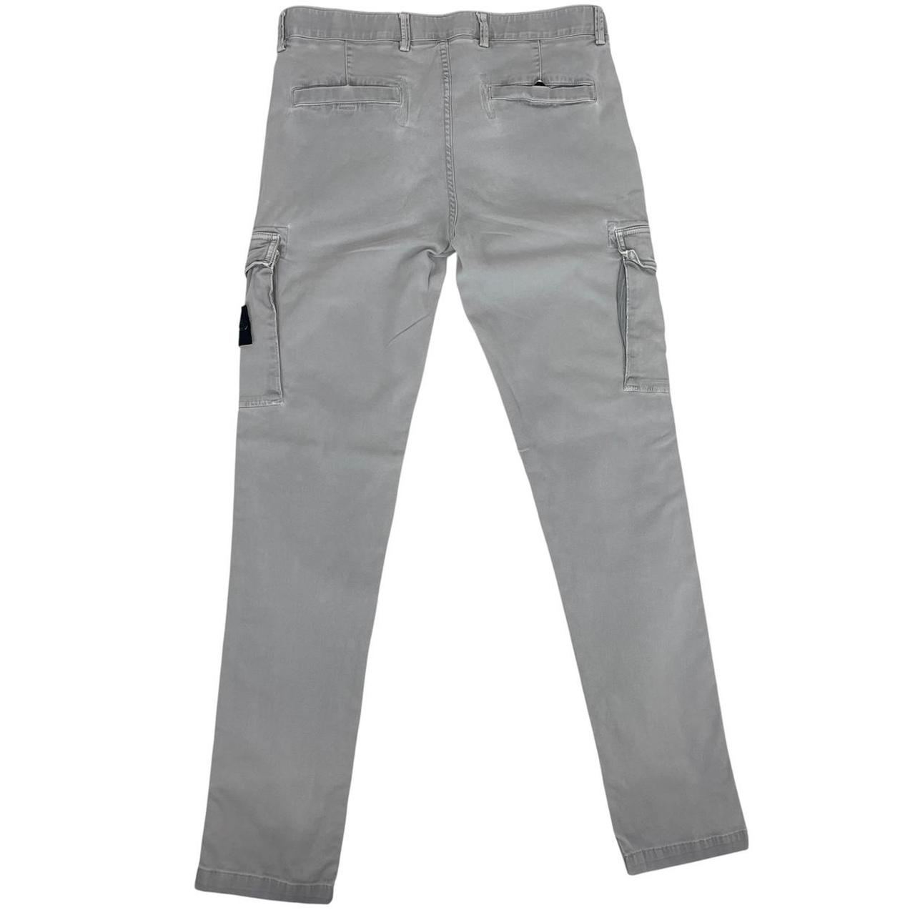 Stone Island grey slim fit cargo trousers with logo patch and repaired back pockets.