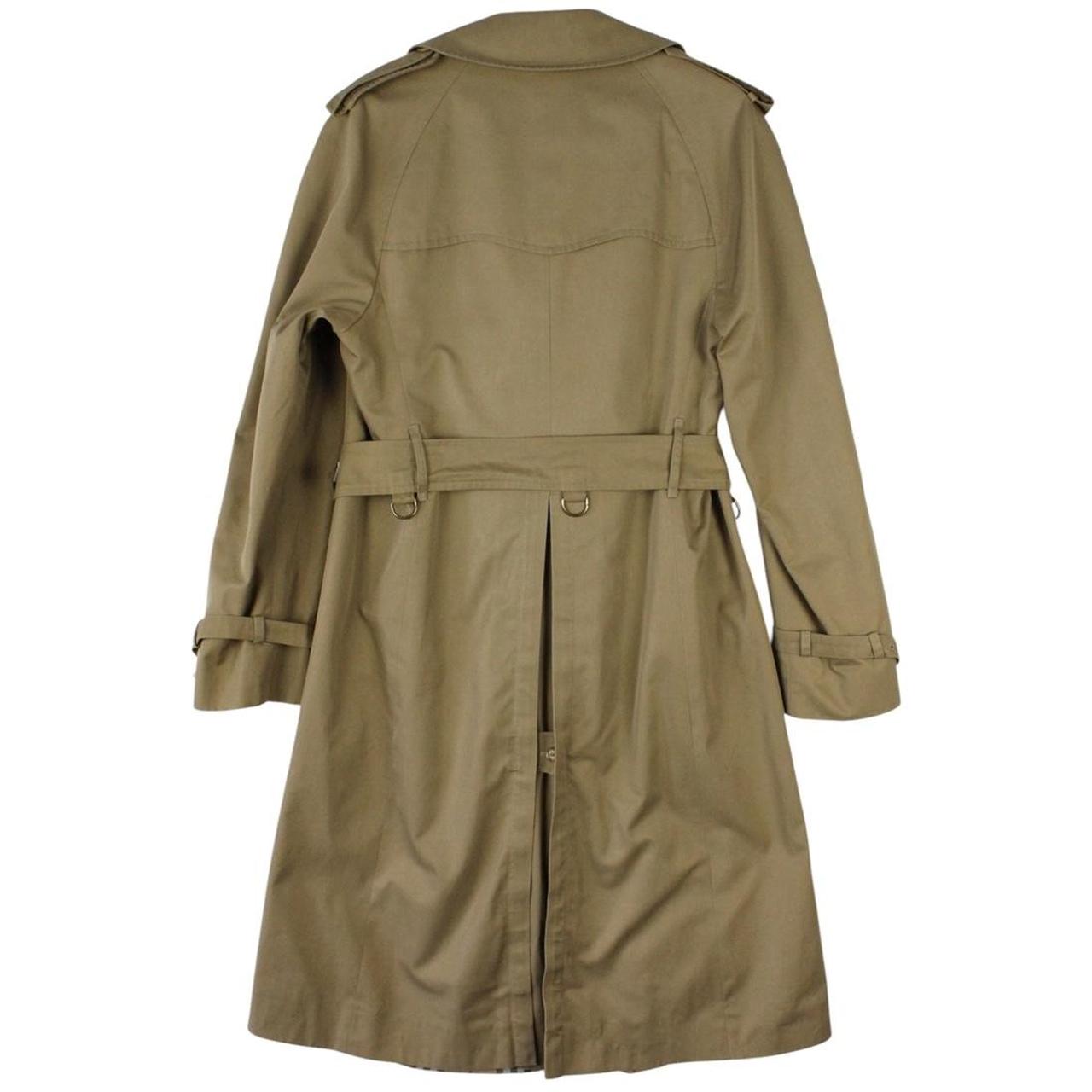 Burberry brown double breasted belted trench coat with classic check lining and logo details.