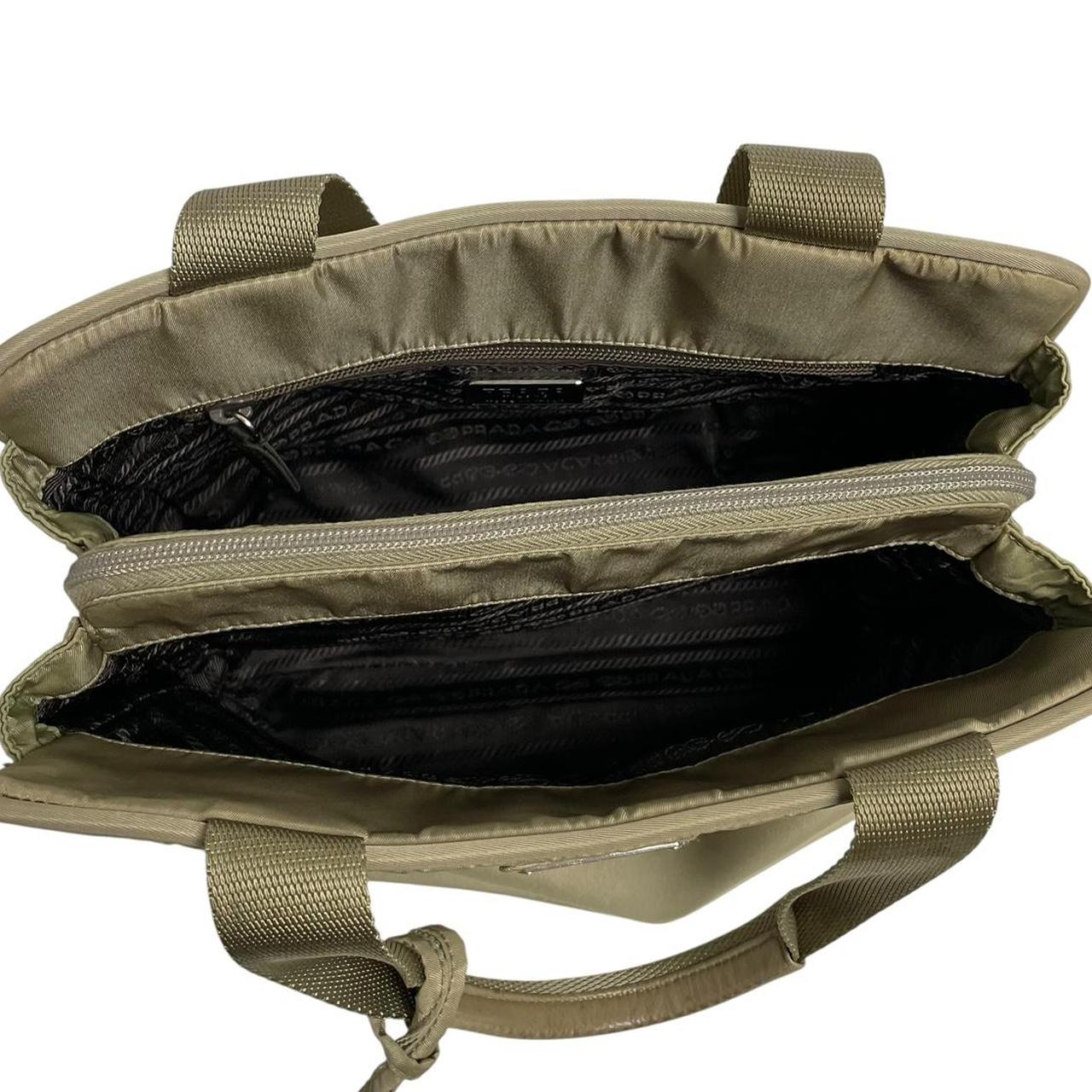 Prada green nylon duffel bag with logo detail and working lock and key.