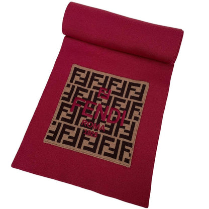 Fendi burgundy scarf featuring FF Zucca monogram pattern in soft virgin wool.