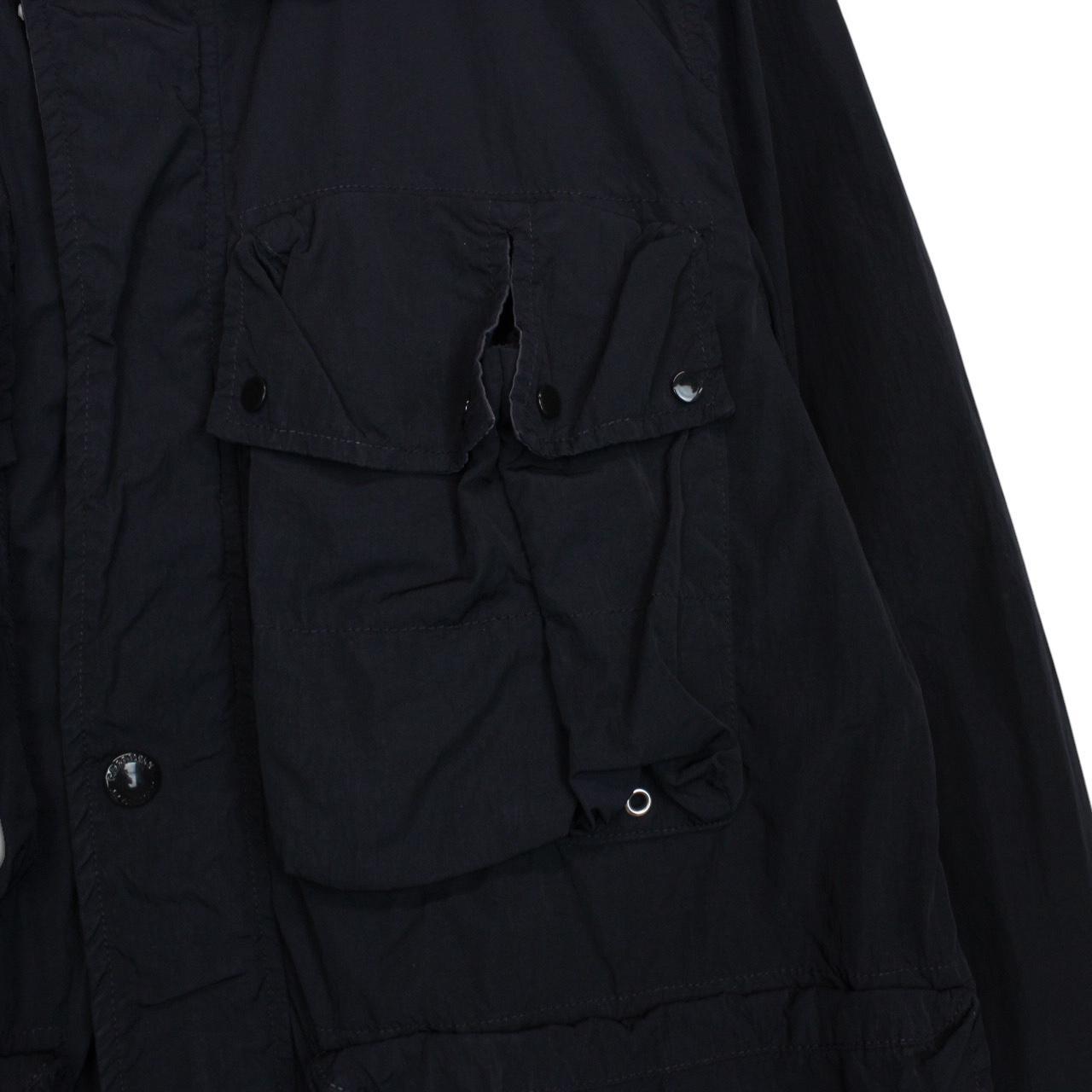 CP Company navy blue nylon jacket with multi pockets and garment dyed finish.