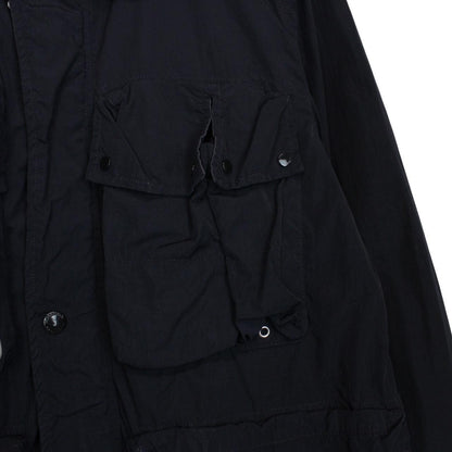 CP Company navy blue nylon jacket with multi pockets and garment dyed finish.