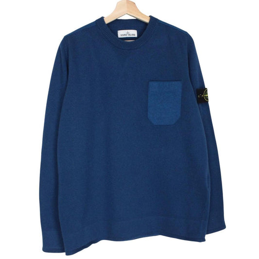 Stone Island blue wool knit jumper with logo patch and ribbed cuffs.