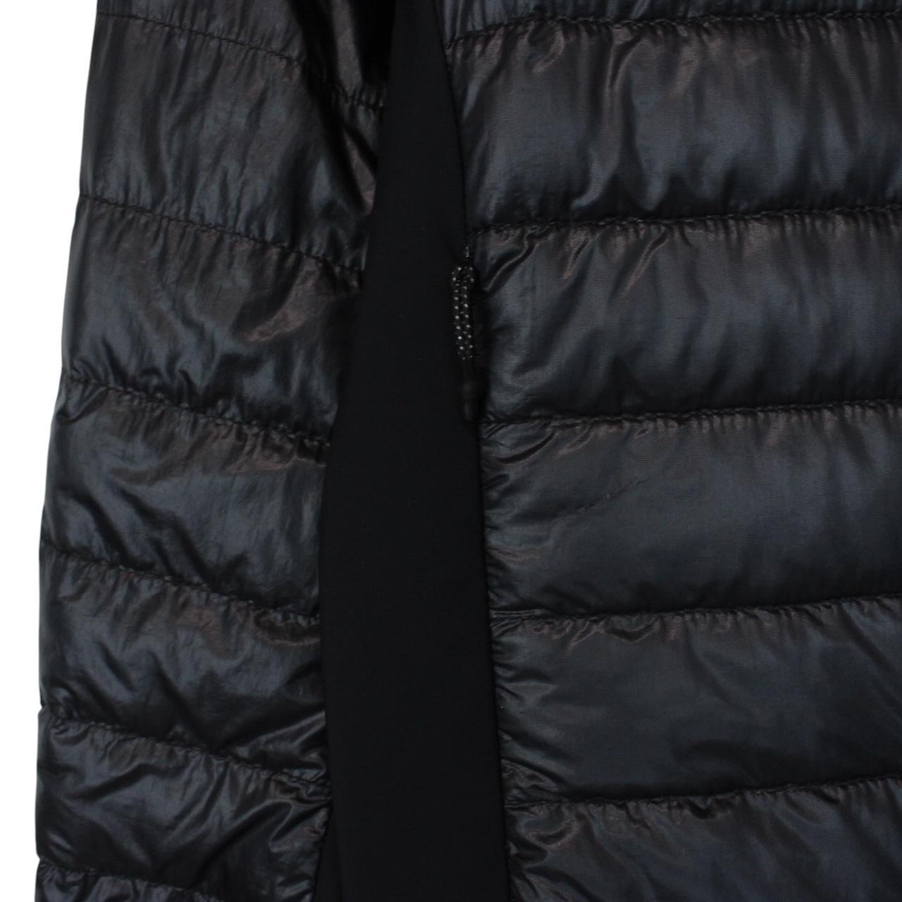 Moncler black lightweight down jacket with full zip and logo patch on sleeve.