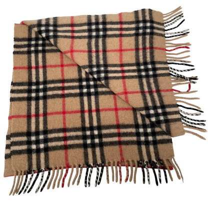 Burberry beige cashmere scarf featuring classic Nova Check pattern and logo detail.