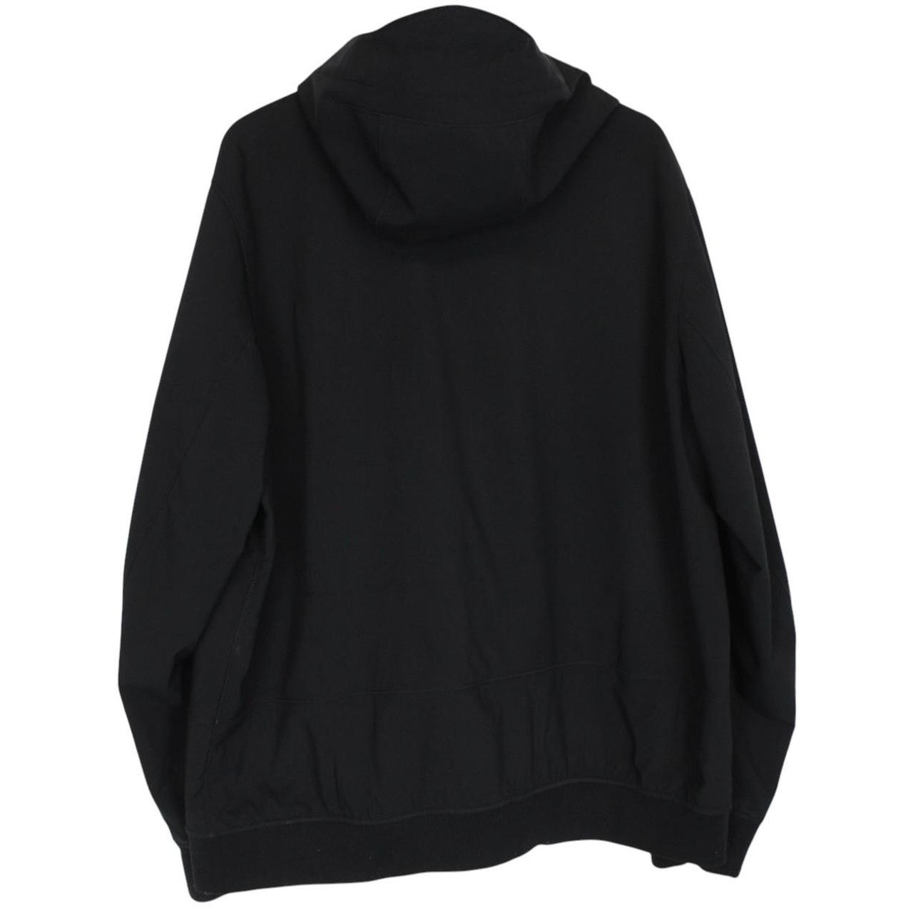 Stone Island black soft shell jacket with full zip and iconic compass logo.