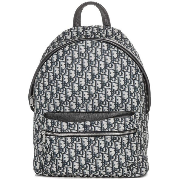 Dior beige and black oblique jacquard monogram rider backpack with logo pattern.