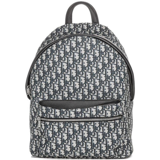 Dior beige and black oblique jacquard monogram rider backpack with logo pattern.