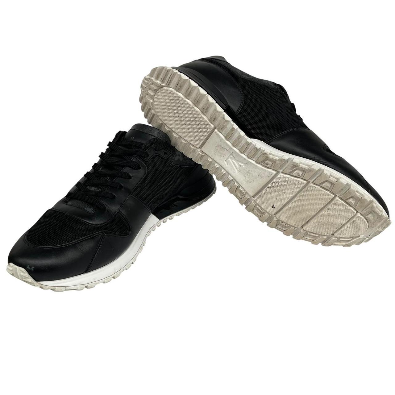 Louis Vuitton black trainers featuring monogram pattern and leather-mesh material.
