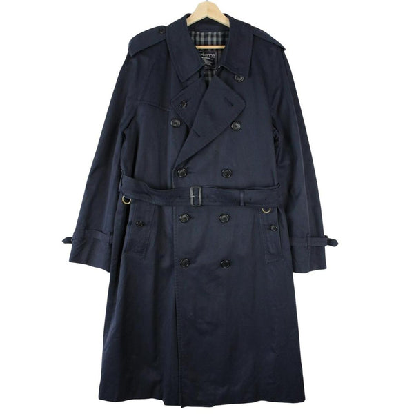 Burberry navy blue belted double breasted trench coat with classic check lining.
