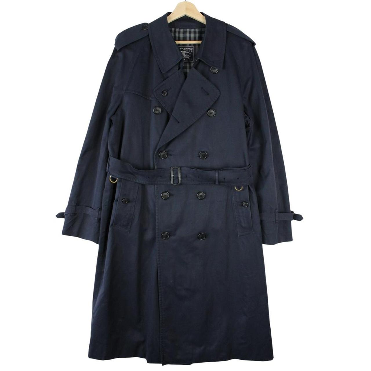 Burberry navy blue belted double breasted trench coat with classic check lining.