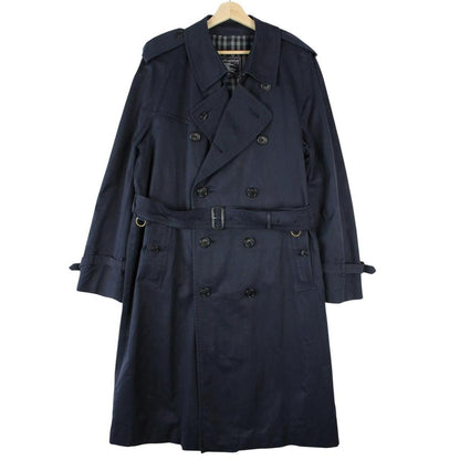 Burberry navy blue belted double breasted trench coat with classic check lining.