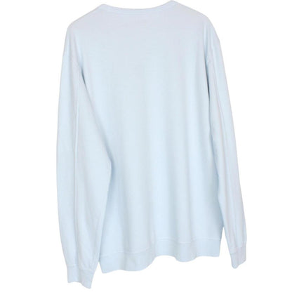 CP Company light blue sweatshirt with signature lens detail and cotton fabric.