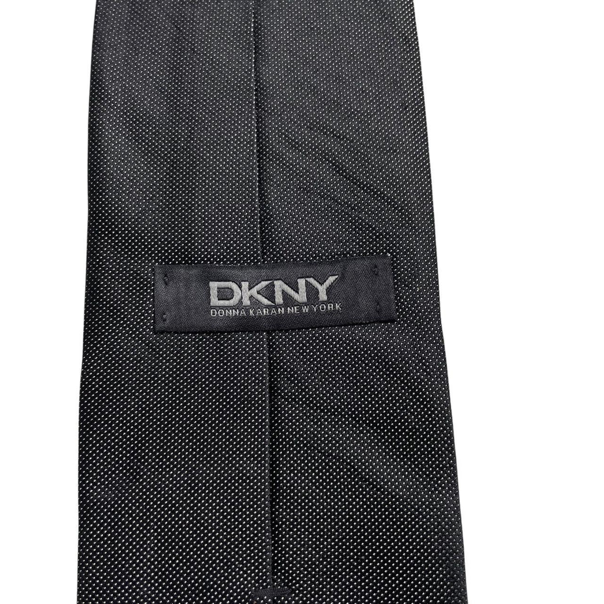 DKNY black silk tie with classic design and subtle sheen.