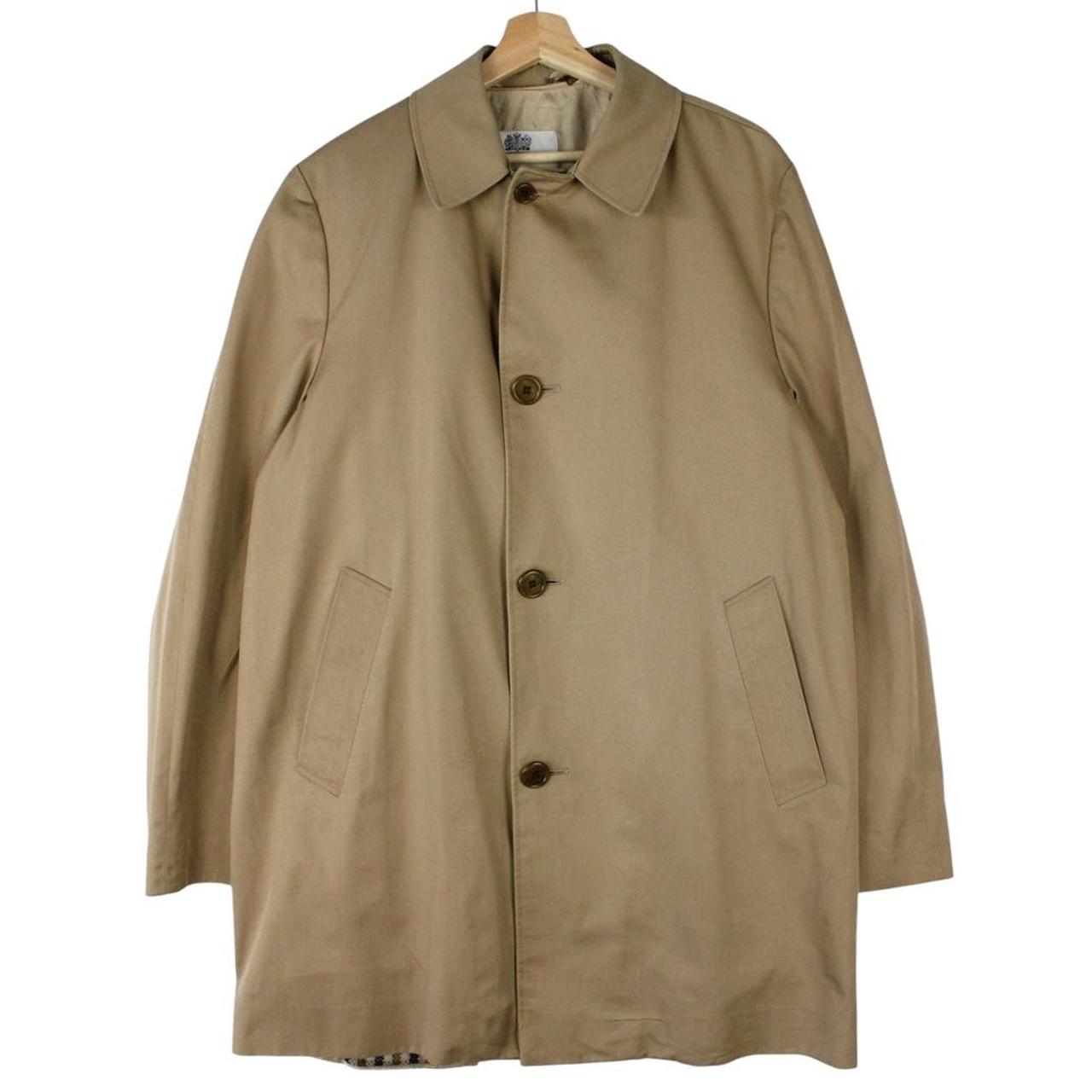 Aquascutum tan brown trench coat with house check pattern and removable wool lining.
