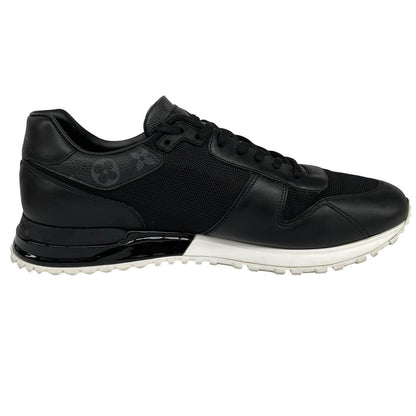 Louis Vuitton black trainers featuring monogram pattern and leather-mesh material.