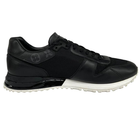 Louis Vuitton black trainers featuring monogram pattern and leather-mesh material.