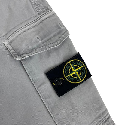 Stone Island grey slim fit cargo trousers with logo patch and repaired back pockets.