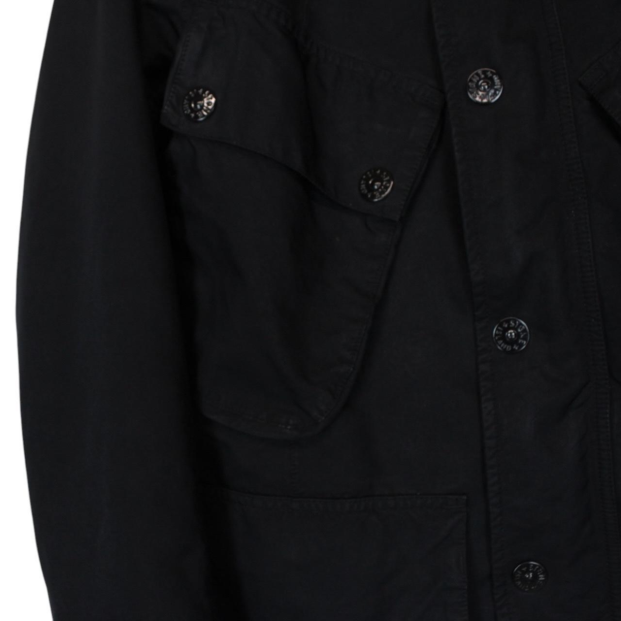 Stone Island black full zip jacket with multi pockets and compass logo detail.