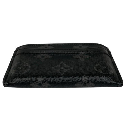 Louis Vuitton black and grey coated canvas double card holder with monogram pattern.