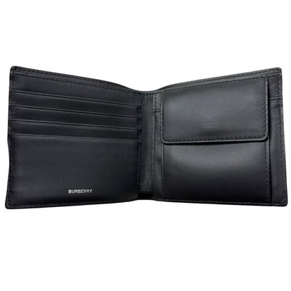 Burberry brown bifold wallet featuring iconic Nova Check pattern and coin pouch.