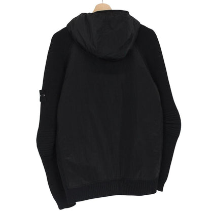 Stone Island black jacket with special process badge and full zip design.