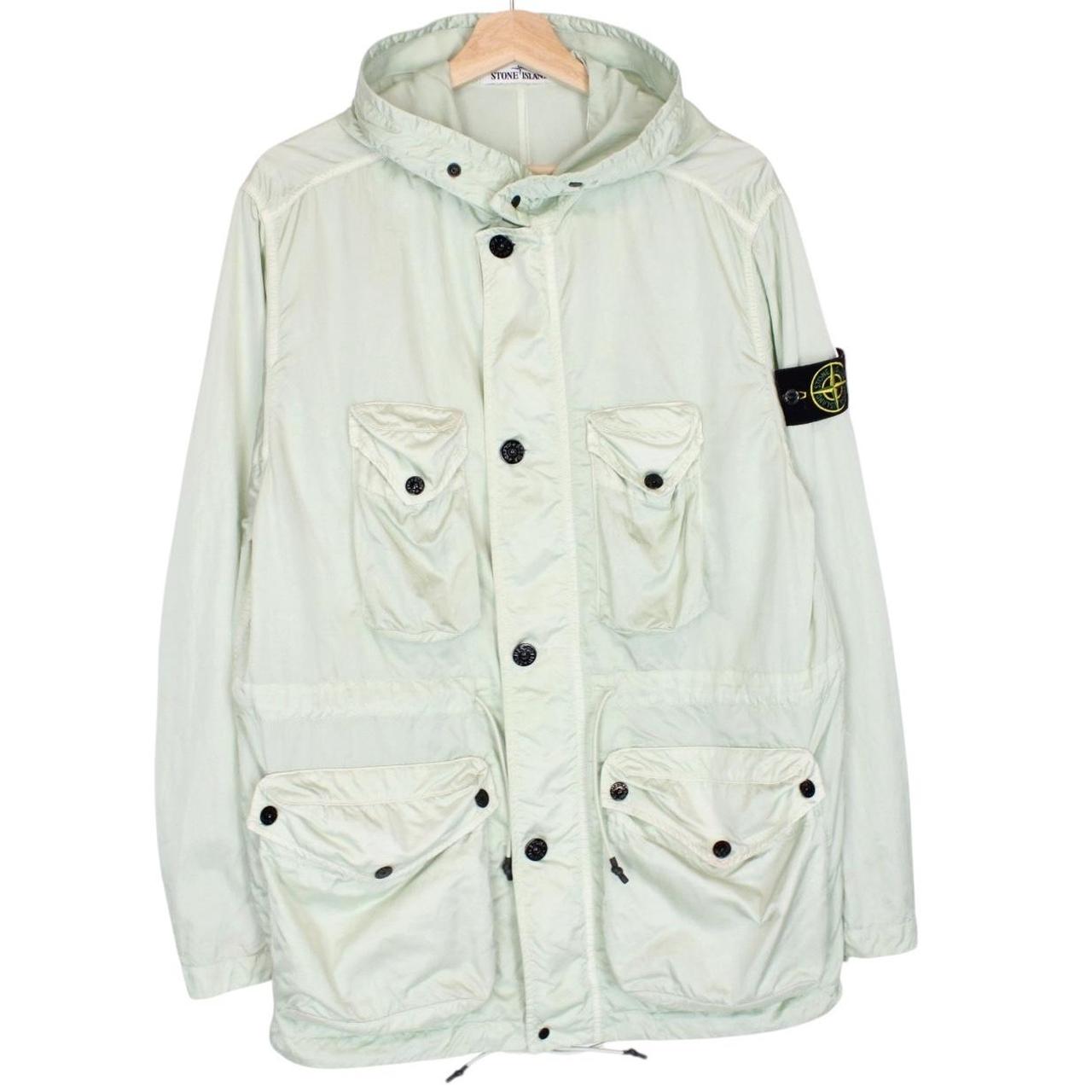 Stone Island mint green multi pocket jacket with logo patch and nylon material.