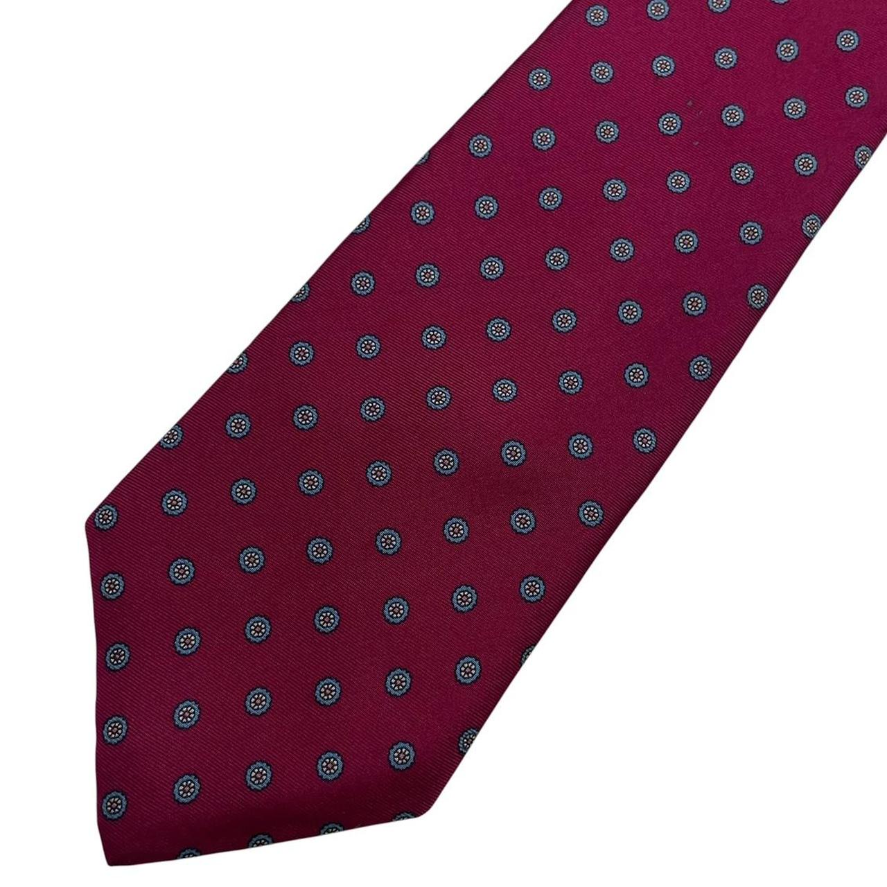 Christian Dior burgundy silk tie with subtle sheen and vintage charm.