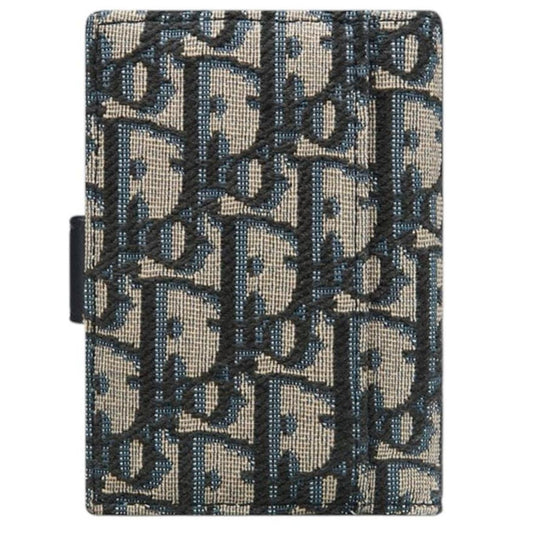 Dior blue card holder featuring Oblique jacquard pattern and dandelion design.
