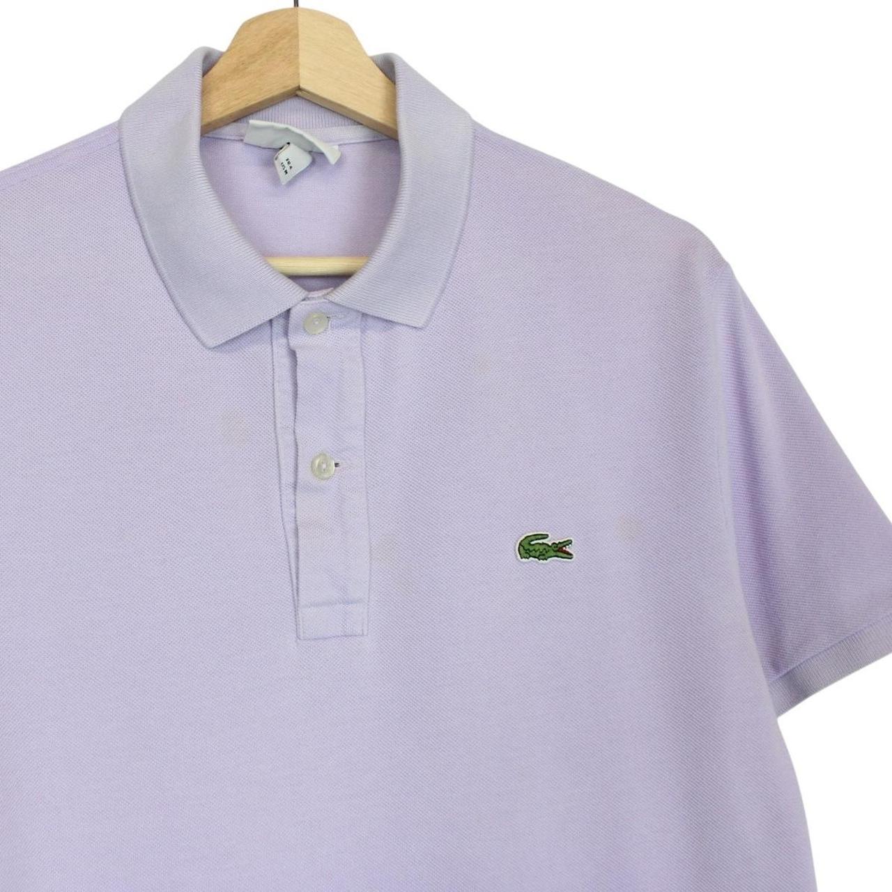 Lacoste lilac purple cotton polo shirt with embroidered crocodile logo and pocket.
