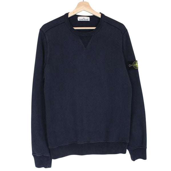 Stone Island navy blue cotton sweatshirt with iconic compass logo and ribbed cuffs.