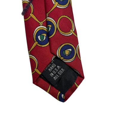Burberry red silk tie featuring vintage horsebit print design.
