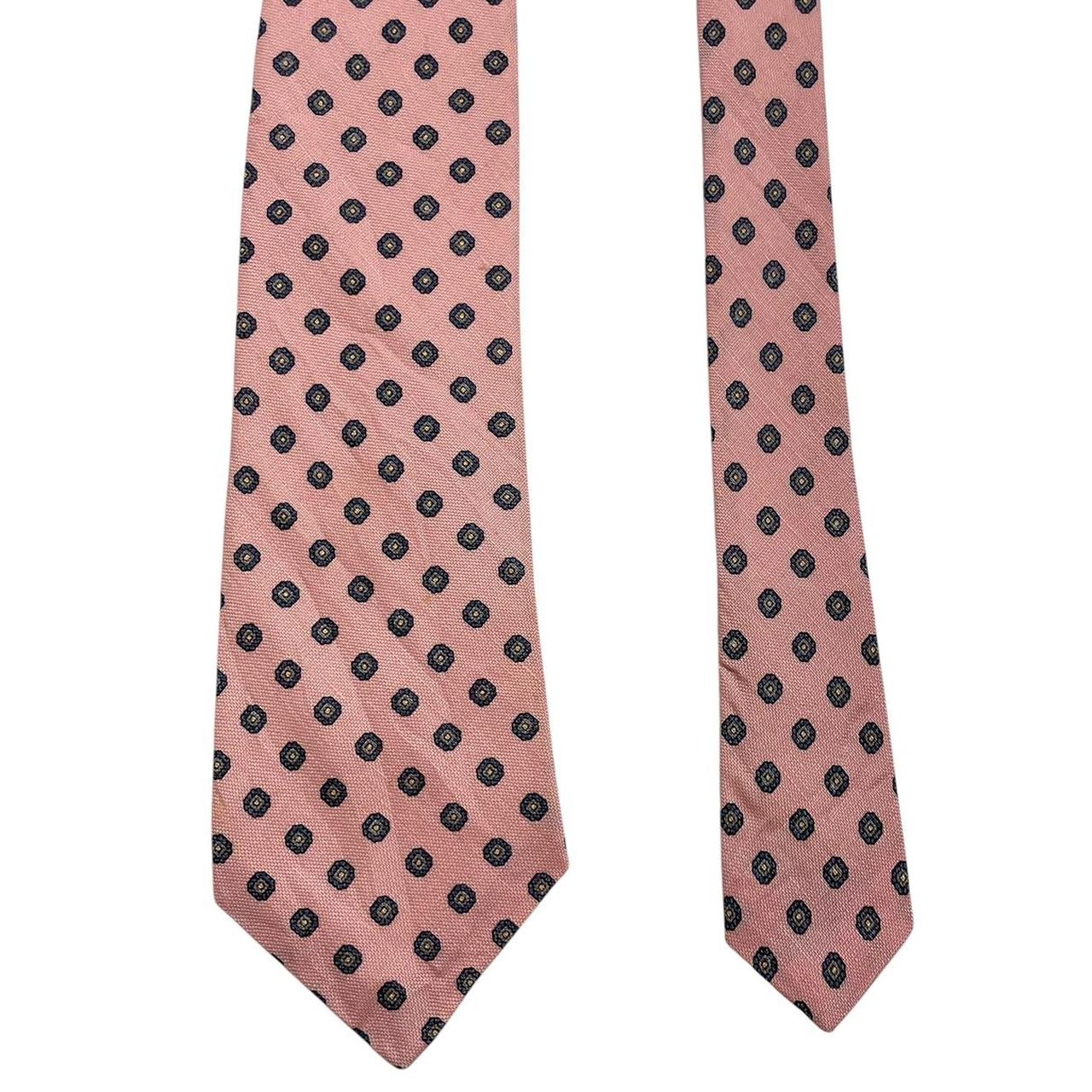 Lanvin pink silk tie with geometric print and logo detail.