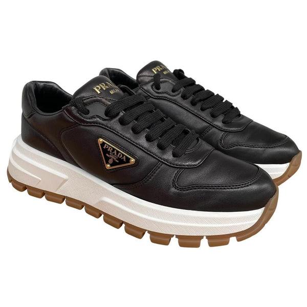 Prada Black and White Triangle Logo Leather Trainers